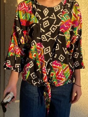 Colorful Vintage 90s geometric shapes blouse. Ties in the front and super fun!